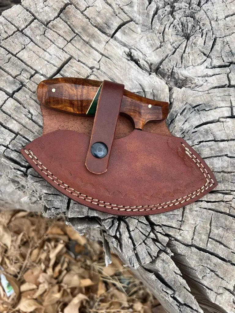 green ulu in sheath.webp