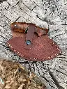 green ulu in sheath.webp